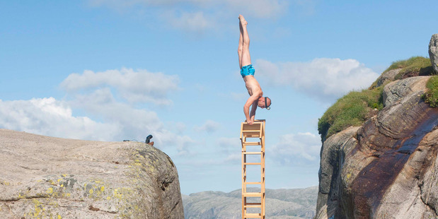 Eskil uses yoga to train and prepare for his bold shapes in dangerous places. Photo / Getty Images