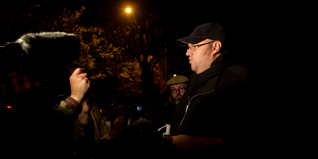 Kim Dotcom speaking to the media after a candlelight vigil at the home of Prime Minister John Key in Parnell, Auckland. Photo / Sarah Ivey