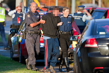 Arrested. Photo / Ben Fraser
