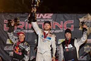 Mike Whiddett (2nd), Gary Whiter (1st) and Curt Whittaker celebrate on the podium.