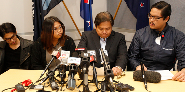 The Gotingco family: l-r: Vincent, Bea, Antonio and John at a police press conference talking about the loss of Blessie. Photo / Chris Gorman