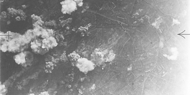 Ray Tait's plane was hit badly during the bombing at the Ostefeld benzol refinery in the Ruhr. The picture was taken during the bombing raid in early 1945.