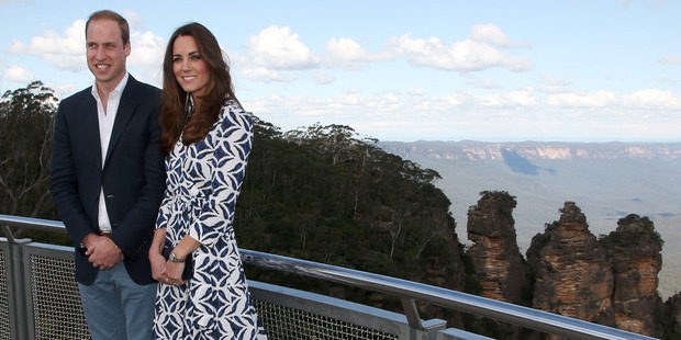 Prince William and his wife, Kate, the Duchess of Cambridge, pose in front of the Three Sisters rock formation in the Blue Mountains during a tour of Echo Point in Katoomba, Australia.
Photo / AP