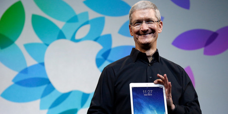 Apple CEO Tim Cook says Apple has finished dating and is now 'getting married' to Jimmy Iovine and Dr Dre. Photo / AP