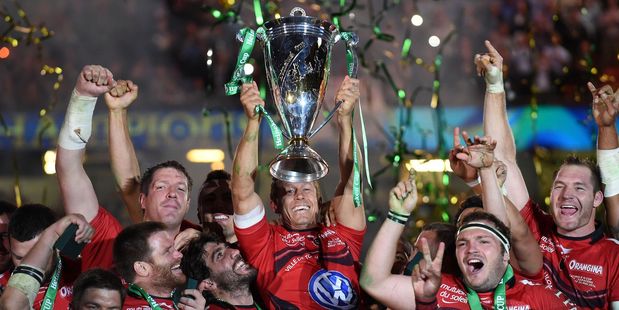 RC Toulon's Jonny Wilkinson lifts the trophy after winning the Heineken Cup Final at the Millennium Stadium. Photo / AP