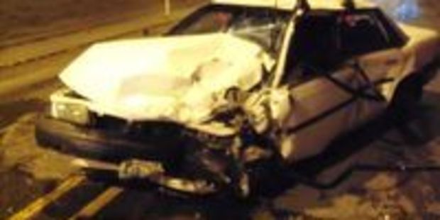 This undated photo provided by the Oregon State Police shows a 1990 Toyota Camry involved in a crash after its driver held his breath driving through a highway tunnel. Photo / AP