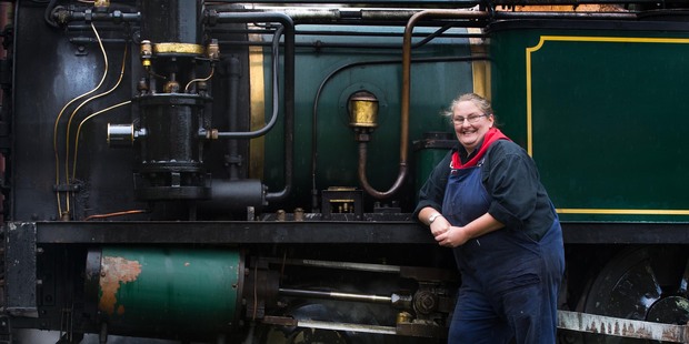 Shantytown steam train driver Iona Littlejohn shows off the engine at the start of a day's travel in the South Island. Photo / Stephen Parker
