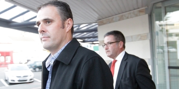 Adam Dunnett (left), outside Napier Courthouse, with lawyer Jonathan Krebs. Photo/File.