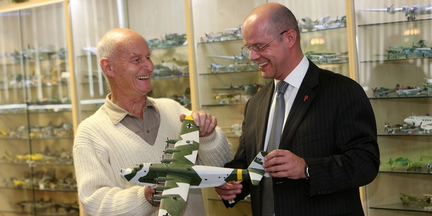 Neil Holder (left) discusses the merits of a German Blohm and Voss long-range reconnaissance aircraft with Morris and Morris general manager Gary Taylor. Photo/Michael Cunningham