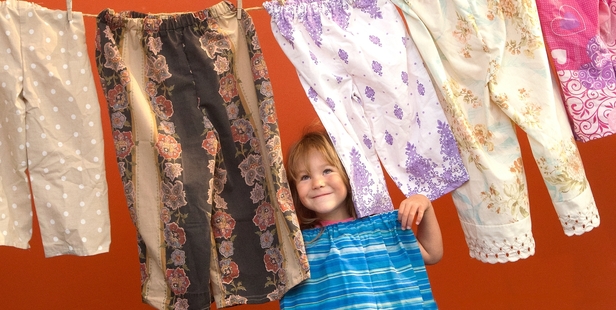 INNOVATIVE: Thayo-Matisse Gapes, 5, checks out the novel bedtime clothing items that will be delivered to a children's refuge shelter in Thailand. PHOTO/BEN FRASER 280514BF2