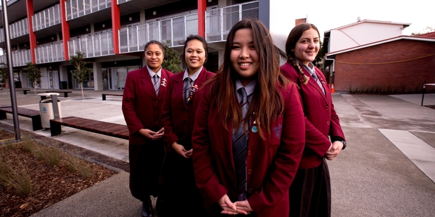 McAuley High School student leaders, from left, Hinemoa Finau, 17, Selena Tugaga, 17, Hazel Celeste, 18, and Lidia Araboo, 17. The school has recorded high marks in NCEA results. Photo / Dean Purcell