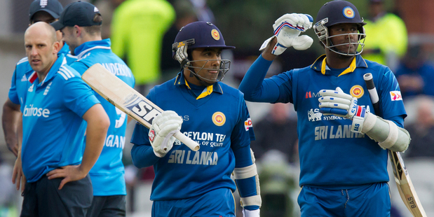 Sri Lanka's Mahela Jayawardene walks from the pitch after losing his wicket LBW for 12. Photo / AP