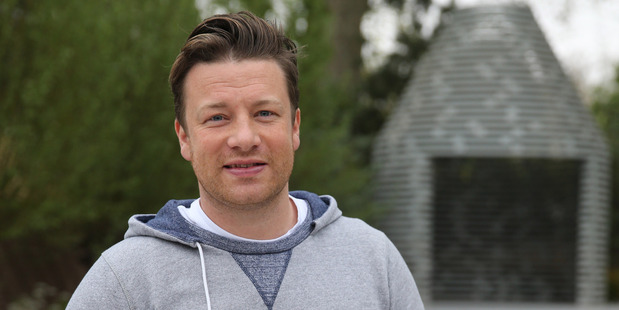 Celebrity chef Jamie Oliver reckons women are better at handling the heat of a barbie.
Photo / Getty