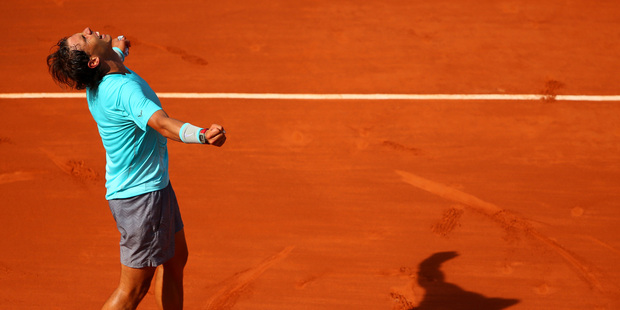 Rafael Nadal of Spain celebrates victory in his men's singles match against Andy Murray of Great Britain on day thirteen of the French Open at Roland Garros. Photo / Getty Images