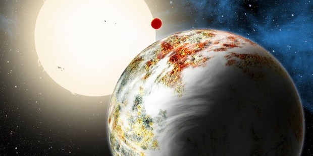The newly discovered 'mega-Earth' Kepler-10c dominating the foreground in this artist's conception. Photo / Harvard-Smithsonian Center for Astrophysics