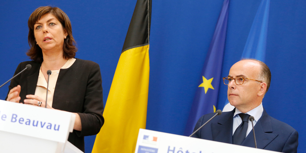 Belgium Interior Minister Joelle Milquet , left, and French counterpart Bernard Cazeneuve address the media in Paris over the killings. Photo / AP