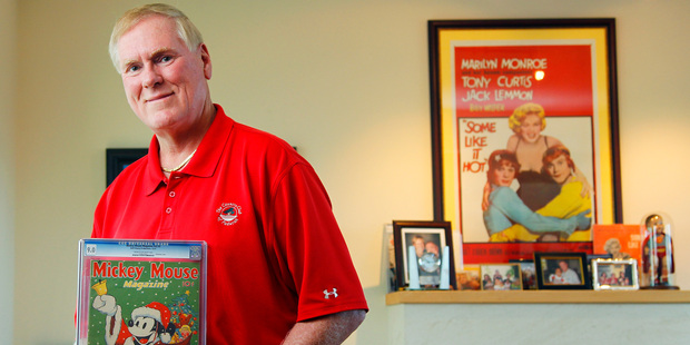 John C. Wise poses in his San Diego home with a 1937 Mickey Mouse Magazine. Photo / AP