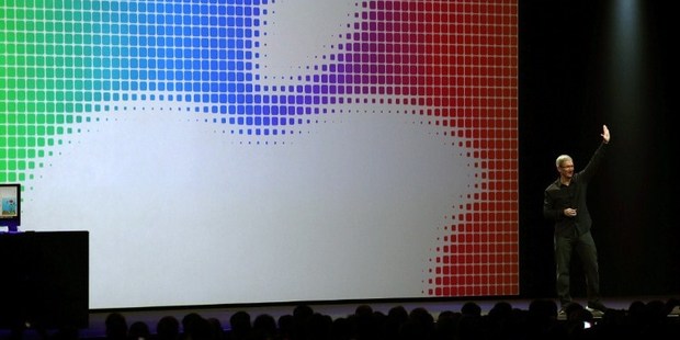 Apple CEO Tim Cook waves during the Apple Worldwide Developers Conference. Apple has 800 million registered iTunes users. Photo / AFP