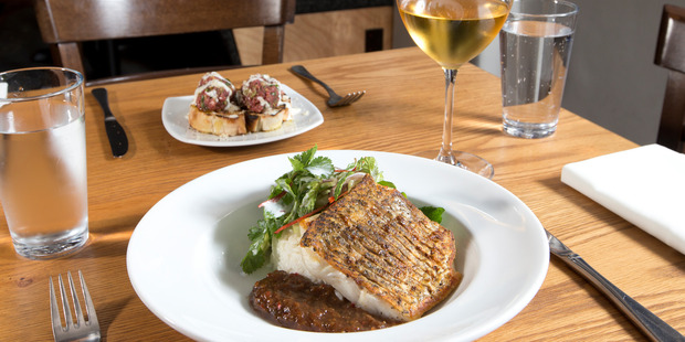Gurnard with tamarind, cucumber coconut rice and mint salad at W.B.C restaurant in Wellington. Photo / Mark Mitchell