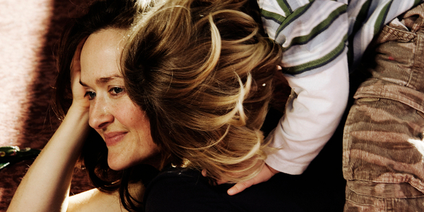 The author, Elisabeth Easther and her son.
