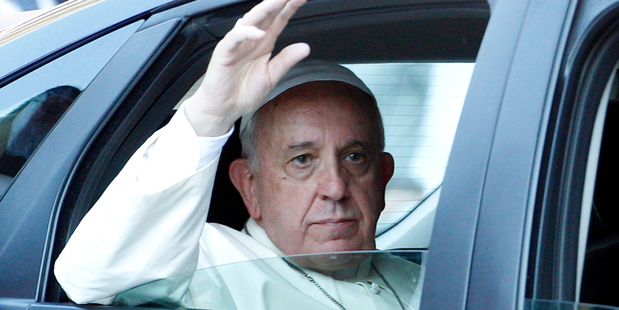 Pope Francis leaves at the end of a meeting with faithful at Rome's Olympic Stadium. Photo / AP