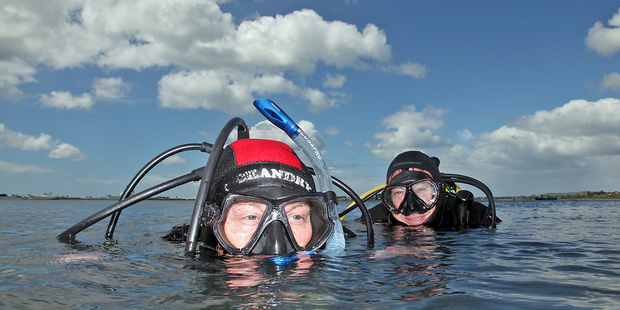 Waikato University Coastal Research Station Technicians Dave Culliford (left) and Rex Fairweather search the shoreline near Devonport Road for the Mediterranean fanworm last year.