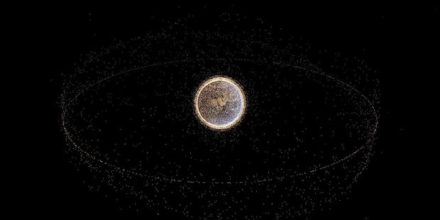 Space debris can whip around the world as fast as 17,000 mph. Rendered image using NORAD data. Every point represents a piece of space debris in the NORAD catalog. Photo / Wikipedia-Yeus