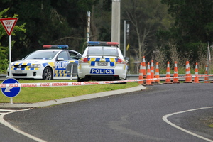 A cordon at the intersection of State Highway 2 and Higginson Road where police shot David Taite. Photo / APN