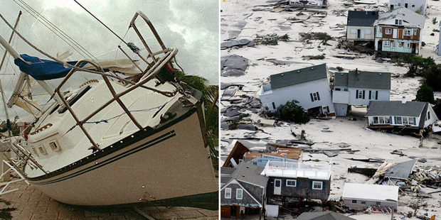 Hurricane Sandy (right) was much more devastating than Hurricane Andrew in 1992 (left) but researchers believe they people are more likely to flee storms with masculine names. Photo / AP