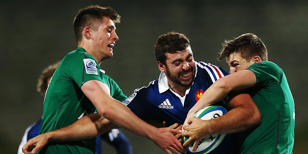 Ivan Roux of France is tackled by Ross Byrne and Garry Ringrose of Ireland. Photo / Getty Images