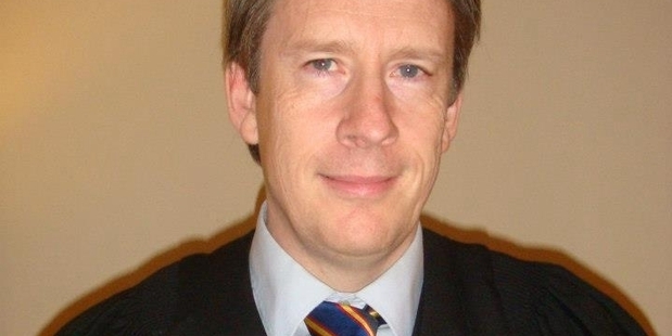 Cox, 49, denies the allegations and is fighting the dismissal.