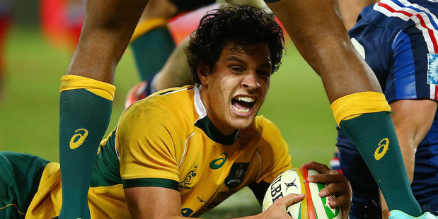 Matt Toomua of the Wallabies celebrates scoring a try against France. Photo / Getty Images