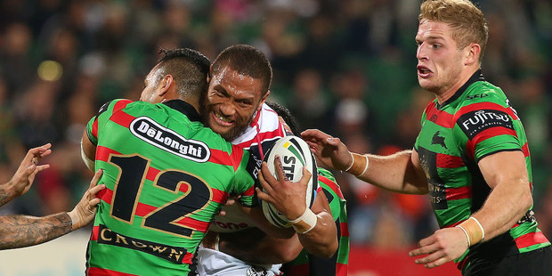 Manu Vatuvei of the Warriors is tackled against the Rabbitohs. Photo / Getty Images