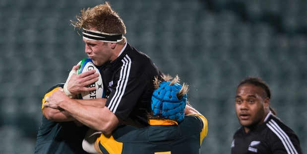 James Tucker tries to smash through South Africa's defence in the pool game loss last week. Photo / Greg Bowker