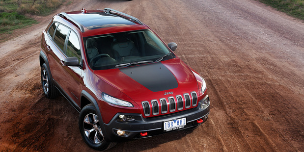 The Jeep Cherokee Trailhawk (front) and Limited (rear) look set to take on top European brands.