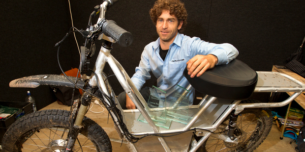 Daryl Neal with a prototype electric farm bike which reaches 40km/h and costs just 7c an hour to run.