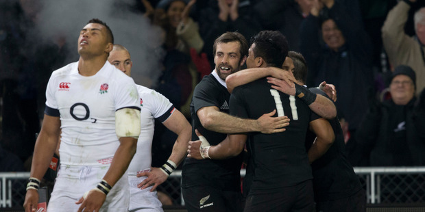 All Blacks celebrate Julian Savea's try against England, during the 2nd test match of the Steinlager Series between the All Blacks and England. Photo / Brett Phibbs.