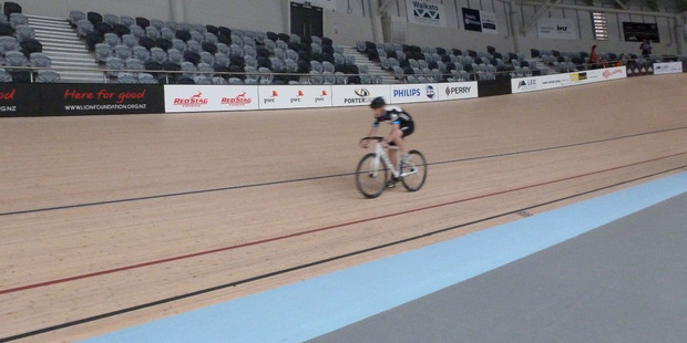 Chris Daniels works his way around the velodrome banking track.