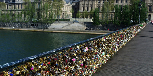 April 9, 2014 file photo shows love locks fixed on the Pont des Arts in Paris. Photo / AP