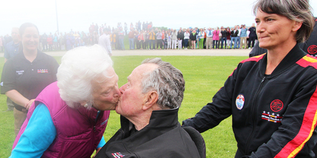 One last kiss from Barbara and ex President George Bush Snr was all set to jump. Photo / All Veteran Parachute Team via AP