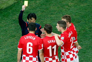 Referee Yuishi Nichimura from Japan gives penalty kick against Croatia. Photo / AP