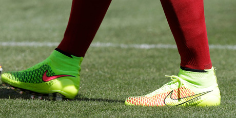 Spain's Andres Iniesta wears his Nike Magista cleats during warm-up before an exhibition game against El Salvador. File photo / AP