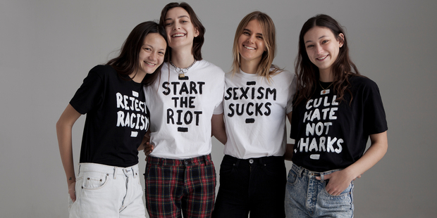 Ollie Henderson (pictured in Start the Riot tee) with model friends, wearing T-shirts from her House of Riot project. Picture / Romain Duquesne