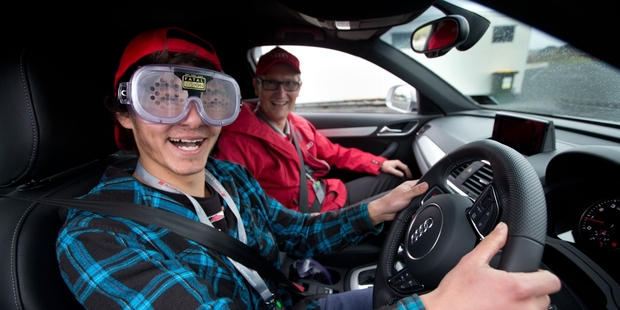 Hamilton mechanics student David Randall-Leon about to take off wearing goggles that simulate what it's like to drive while intoxicated - all under the watchful eye of instructor Stu Owers. Photo / Richard Robinson