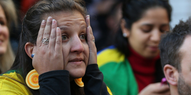 A Brazilian fan watching the game. Photo / Greg Bowker