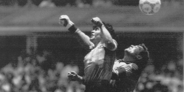 Argentina's Diego Maradona, left, famous 'Hand of Goal' goal against England goalkeeper Peter Shilton in the 1986 World Cup. Photo / AP