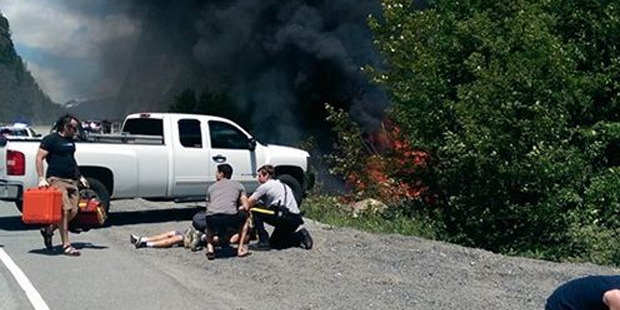 Buddy Harwood also helped to rescue three adults at the scene.