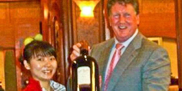 Donghua Liu's partner Juan Zhang and Rick Barker at a Labour fundraising auction in 2007.