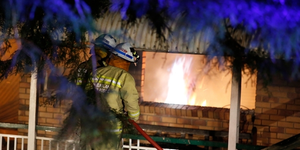 The fire destroyed the rented Gold Coast home of Adam and Kayla Bell. Photo / Gold Coast Bulletin