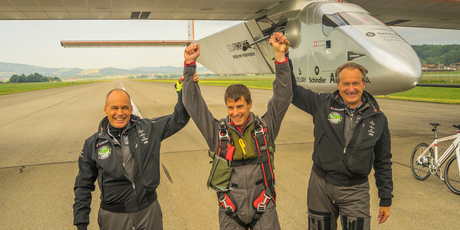 Bertrand Piccard (left) and André Borschberg (right) congratulate test pilot Markus Scherdel. Photo © Solar Impulse / Revillard / Rezo.ch